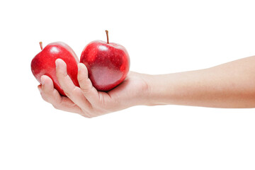 hand holding a ripe red apple on outstretched hand isolated white background