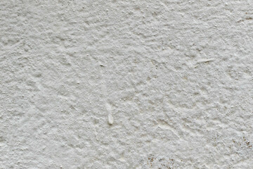 Rough concrete wall painted white background