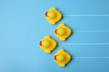 Toy ducks on track. Business competition, achieving goal and progress to goal concept.