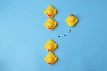 Toy duck walking to different way. individuality and different creative idea concept