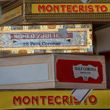 LONDON, UK -SEPTEMBER 14, 2019: Stack of old Cigar Boxes - Montecristo, Romeo Y Juliet brand