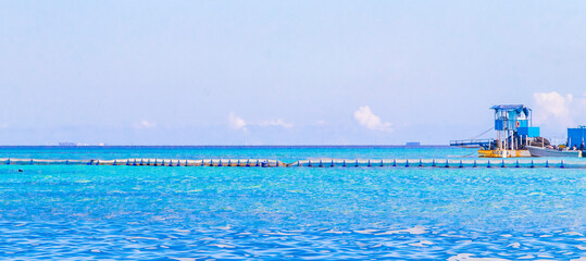 Boats yachts ship jetty beach in Playa del Carmen Mexico.