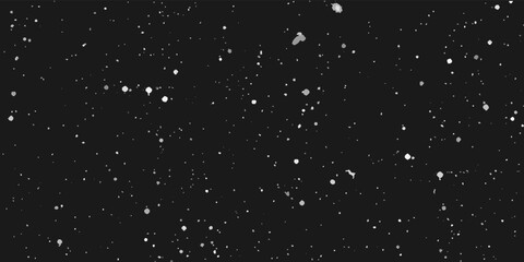 Falling snow freeze motion in the dark sky. Texture isolated on black background. Perfect for white snowflakes overlay, winter abstract