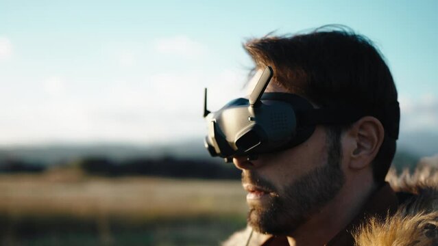 Close-up of a man drone fpv operator with vr goggles