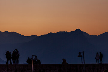 people taking pictures at sunset selfie silhouette valentine's day