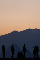 people taking pictures at sunset selfie silhouette valentine's day