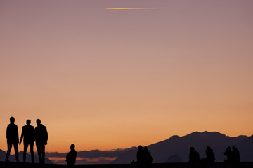 people taking pictures at sunset selfie silhouette valentine's day