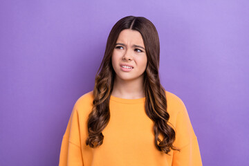 Photo of stressed depressed lady wear stylish clothes suspiciously look empty space weird idea plan isolated on purple color background