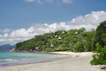 Fototapeta na wymiar Mahe Seychelles 04.01.2023 beautiful Louis beach on the west cost of Mahe, the beach have a 5 star resort near called Maia 