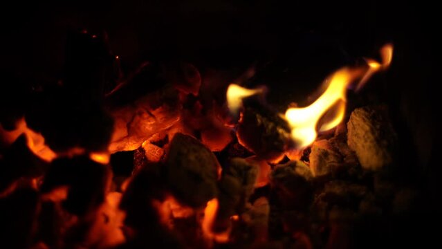 bonfire campfire with coal and wood burning on the harvest festival of Lohri in India