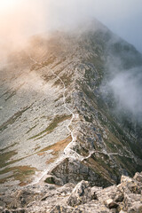 Breathtaking views over the valley of impressive Tatra mountains in misty weather. National park in Zakopane, Poland. © Viesturs