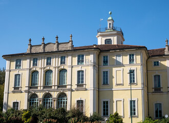 Milan - Palazzo Dugnani, baroque facade of palace overlooking the historic public park Indro Montanelli. Lombardy
