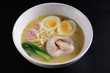 Ramen Japanese noodle isolated in black background