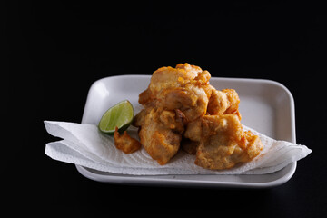 Chicken Karaage Japanese Fried chicken isolated in black background