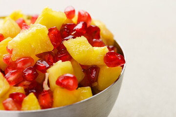 Pineapple chunks and pomegranate seeds