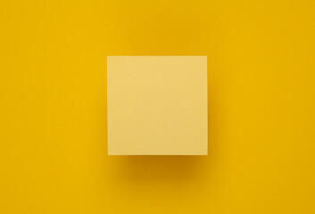 Yellow memo papers on a yellow background