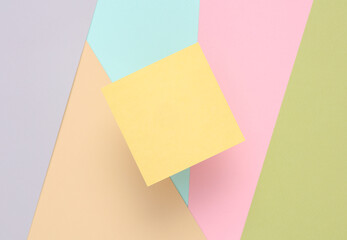 Empty Memo square sheet of paper on colored background