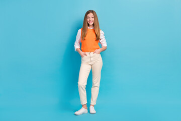Fototapeta na wymiar Full length photo of adorable lovely lady dressed comfort clothes new collection special offer isolated on blue color background