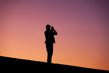people taking pictures at sunset selfie silhouette valentine's day