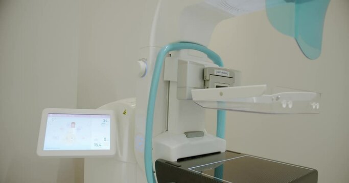 Cancer Prevention Routine in Hospital Room. Medical breast x-ray for women. clean medical equipment in the clinic. Hospital Radiology Room. high-performance Mammography device in a modern hospital.