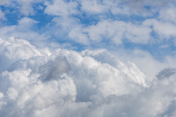 Cumulus cloud formations with a blue sky.