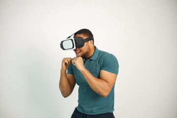 Black guy with virtual reality glasses isolated on white background