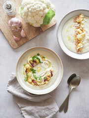 Cauliflower and roasted garlic cream. Ideas and recipes for healthy food. Top view.