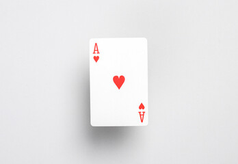 Ace of hearts on a gray background. Playing card