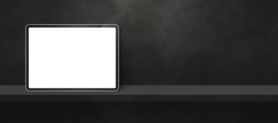 Digital tablet pc on black wall shelf. Background banner