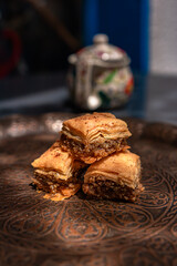 baklava on a brown plate