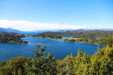Fototapeta na wymiar Landscape of Lake Nahuel Huapi. Bariloche, Río Negro, Argentina. Patagonia. Panoramic view. Touristic city. Mountains and lake. pine forests. Islands. 