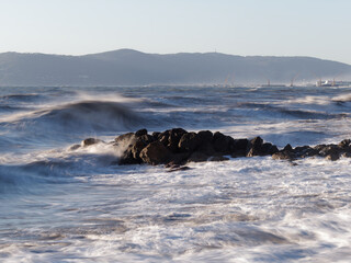Crashing waves on the beach in massa