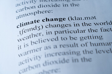 A mock up of a dictionary page with the word climate change with selective focussing