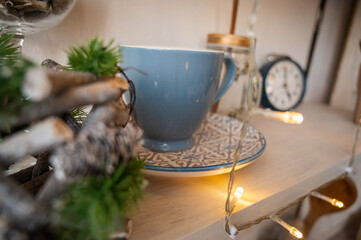 a cup of coffee on the table, on the table