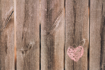 chalk heart on wooden background