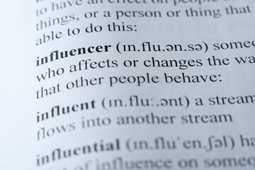 A mock up of a dictionary page with the word influencer with selective focussing
