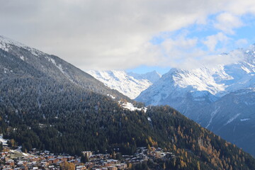 Fototapeta na wymiar View of the Swiss alps over the ski resort town of Verbier, Valais, Switzerland in autumn