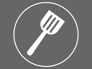 Spatula icon. Vector kitchen utensil for frying isolated on dark background