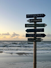 sign on the beach in the morning