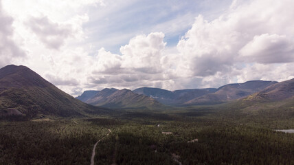 Fototapeta premium Beautiful dramatic mountain landscape. Foggy mountain valley