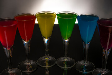 Dark black background with color glass shots