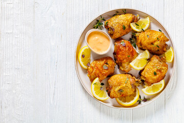 roast chicken thighs with lemon, thyme and spices