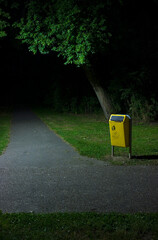 Garbage can in park, keep our parks clean, dark park path, keep our parks clean, Ridderkerk, Holland, The Netherlands, Dutch.