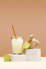 Refreshing ginger drink with lime. Lime and ginger organic probiotic drink. Creative minimal concept. 