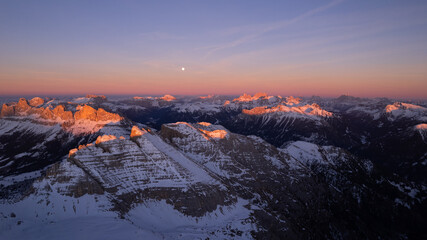 sunrise in the snow dolomites