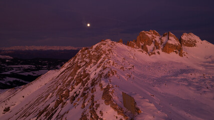 sunrise in the snow dolomites