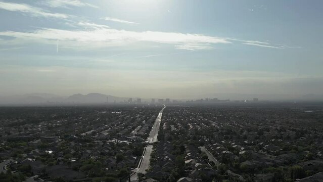 Drone footage of Las Vegas, from a distance, flown over a residential neighborhood. 