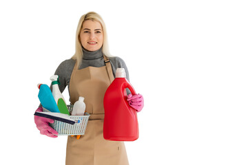 Young woman holding cleaning tools, isolated on white