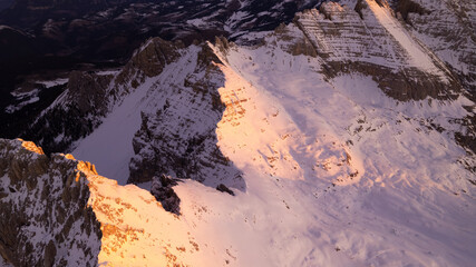 sunrise in the snow dolomites