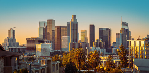 the skyline of los angeles during sunset - 560247374